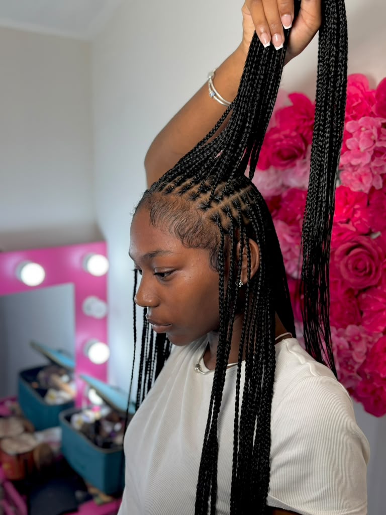 Long braids shown from the side